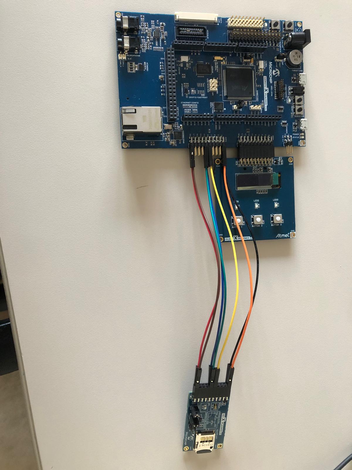 SAMV71 board from microchip with OLED display module attached to it