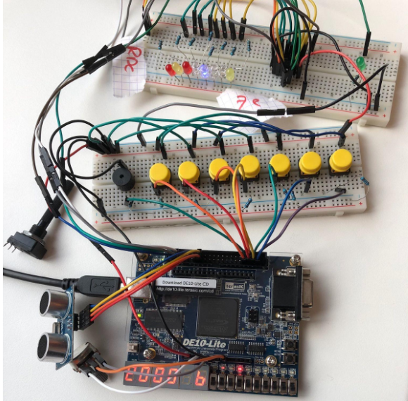FPGA assembled with breadboard components. Leds representing building levels, and the board
